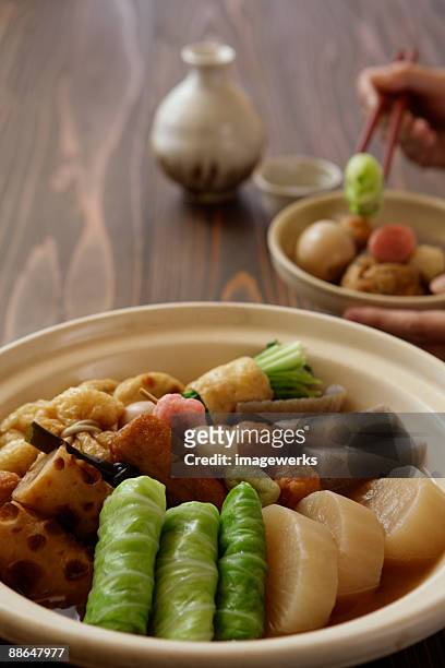 oden with saki set on table, close-up - cabbage roll stock pictures, royalty-free photos & images