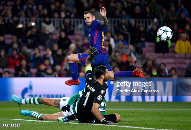 Rui Patricio of Sporting Lisbon saves from Paco Alcacer of Barcelona during the UEFA Champions League group D match between FC Barcelona and Sporting...