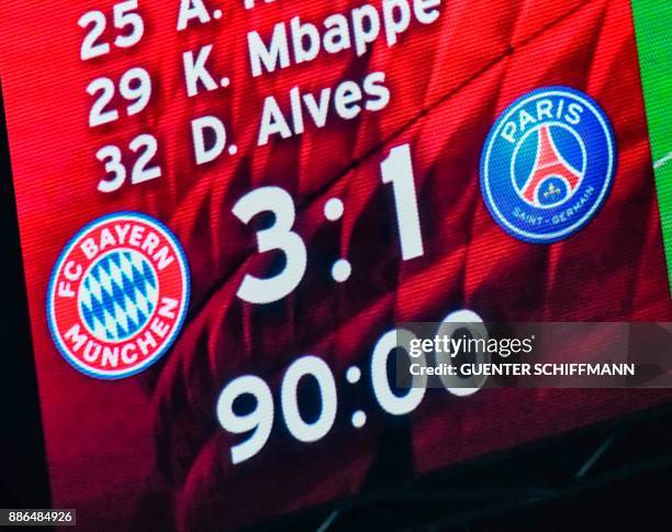 The scoreboard shows the final score 3-1 after the UEFA Champions League football match between Paris Saint-Germain and Bayern Munich, on December 5,...