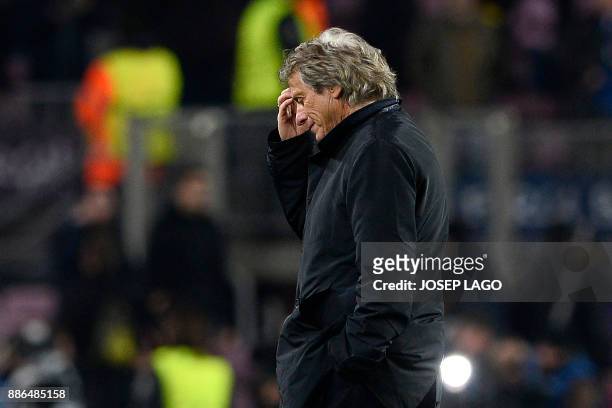 Sporting's Portuguese coach Jorge Jesus reacts at the end of the UEFA Champions League football match FC Barcelona vs Sporting CP at the Camp Nou...