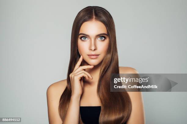 beautiful woman with make-up - straight hair stock pictures, royalty-free photos & images