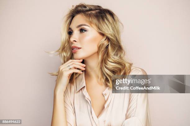 blond woman with perfect skin - woman beautiful brows beauty stock pictures, royalty-free photos & images