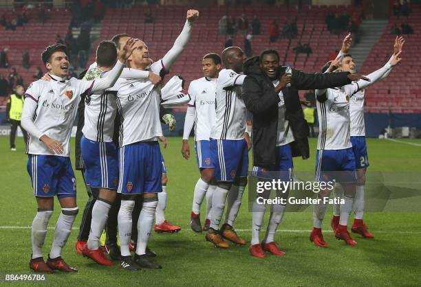 Fc Basel players celebrate the victory at the end of the UEFA Champions League match between SL Benfica and FC Basel at Estadio da Luz on December 5,...