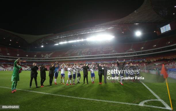 Fc Basel players and staff members celebrate the victory at the end of the UEFA Champions League match between SL Benfica and FC Basel at Estadio da...