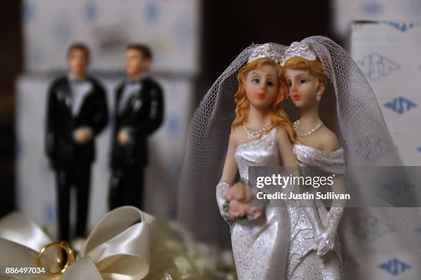 Same-sex marriage cake toppers are displayed on a shelf at Fantastico on December 5, 2017 in San Francisco, California. The U.S. Supreme Court is...