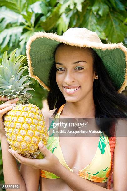 woman holding a pineapple - the cayes stock pictures, royalty-free photos & images