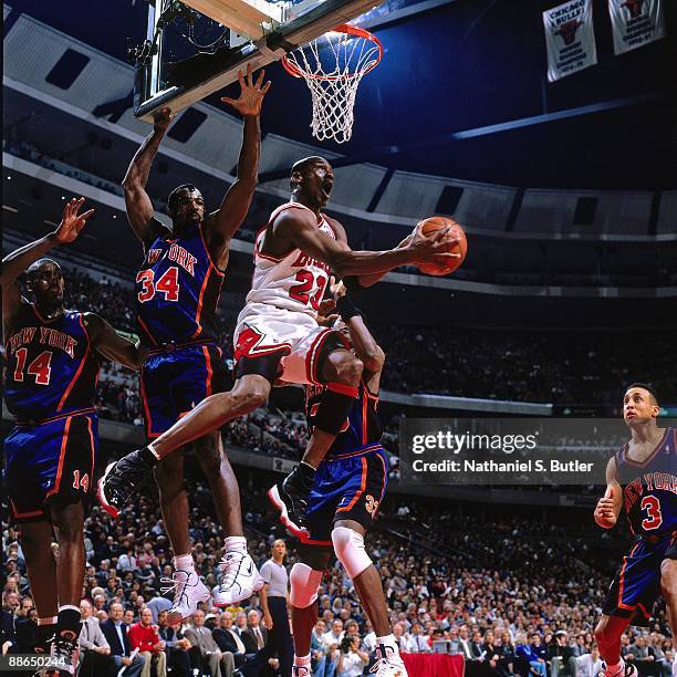 Michael Jordan of the Chicago Bulls goes up for a shot against the New York Knicks in Game Five of the Eastern Conference Semifinals during the 1996...