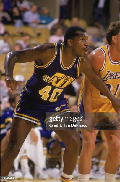 Mike Brown of the Utah Jazz boxes out during an NBA game against the Los Angeles Lakers at the Great Western Forum in Los Angeles, California in 1988.