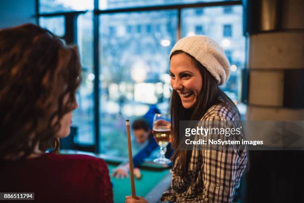 friends playing snooker in a pub. - snooker break stock pictures, royalty-free photos & images