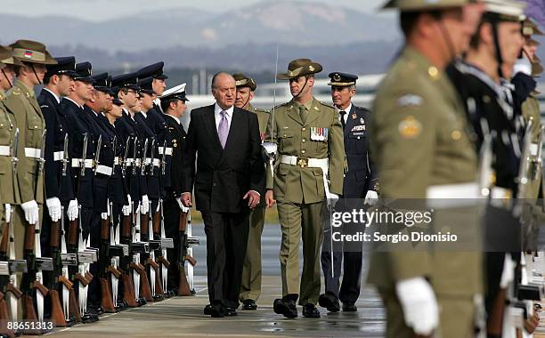 King Juan Carlos I inspects the Australian Federation Guard during his arrival in Australia for their 3 day State visit, at the Defence Establishment...