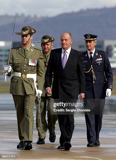 King Juan Carlos I inspects the Australian Federation Guard during his arrival in Australia for their 3 day State visit, at the Defence Establishment...