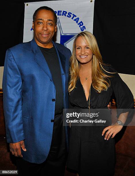 Television personalites John Saunders and Jenn Brown attend ABC Television & Juma Entertainment's "The Superstars" premiere party at Saddle Ranch on...