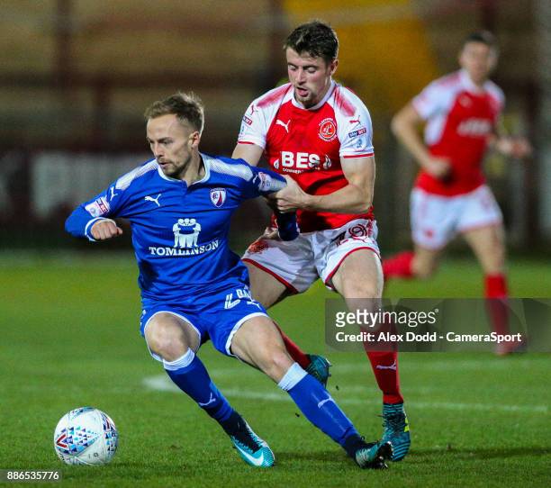 Chesterfield's Andy Kellett holds off the challenge from Fleetwood Town's Jack Sowerby during the EFL Checkatrade Trophy Second Round match between...