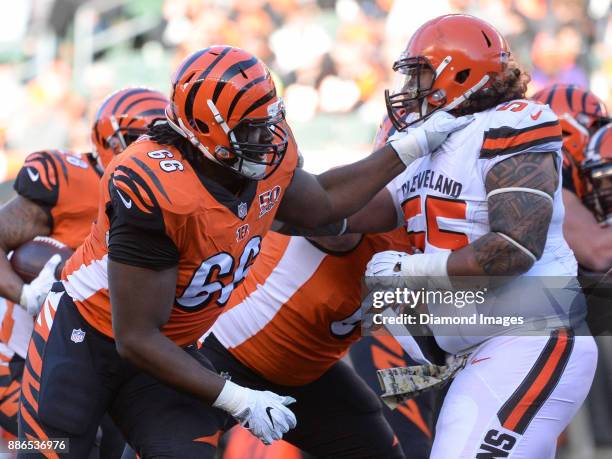 Right guard Trey Hopkins of the Cincinnati Bengals engages defensive tackle Danny Shelton of the Cleveland Browns in the third quarter of a game on...