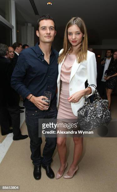 Orlando Bloom and Miranda Kerr at Audi's celebration of the arrival of TDI clean diesel technology held on June 23, 2009 in Beverly Hills, California.