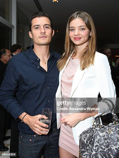 Orlando Bloom and Miranda Kerr at Audi's celebration of the arrival of TDI clean diesel technology held on June 23, 2009 in Beverly Hills, California.