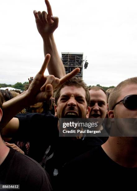 Hard rock fans screaming in the audience at the heavy metal Sonisphere Festival where Metallica, Slipknot, Korn, Lamb of God and Down were performing...