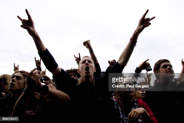 Hard rock fans screaming in the audience at the heavy metal Sonisphere Festival where Metallica, Slipknot, Korn, Lamb of God and Down were performing...