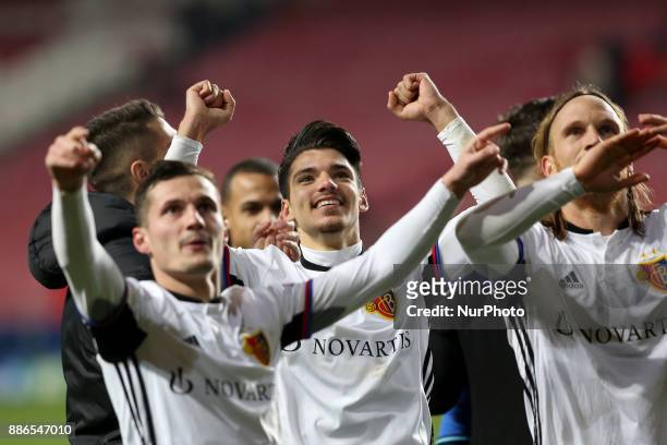Basel's players celebrate the victory after the UEFA Champions League Group A football match between SL Benfica and FC Basel at the Luz stadium in...