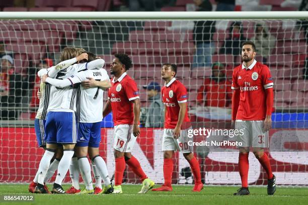 Basel's players celebrate the victory after the UEFA Champions League Group A football match between SL Benfica and FC Basel at the Luz stadium in...