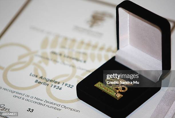 The number 33 Olympian pin for former athlete Jack Lovelock is on display during an evening to celebrate New Zealand's 1000 Olympians at Alexandra...