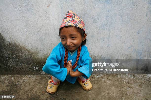 Khagendra Thapa Magar, 15 and a half, poses for the camera on March 13, 2007 in Pokhara, Nepal. According to the Guinness World Book of Records when...