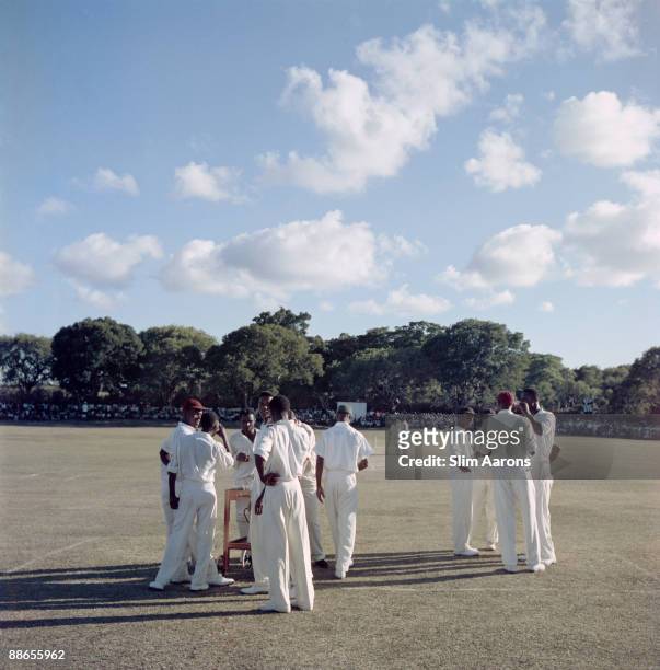 Cricketers on the field during a match between the Leeward Islands and the MCC, Antigua, West Indies, 1960.