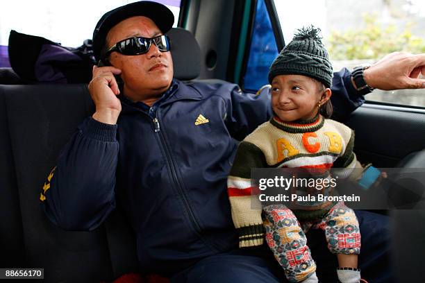 Khagendra Thapa Magar, 15 and a half, goes on a ride to Fewa Lake with his manager Min Bahadur Rana Magar on March 13, 2007 in Pokhara, Nepal....