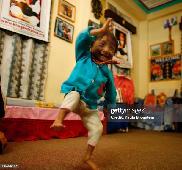 Khagendra Thapa Magar, 15 and a half, dances to some music on March 13, 2007 in Pokhara, Nepal. According to the Guinness World Book of Records when...