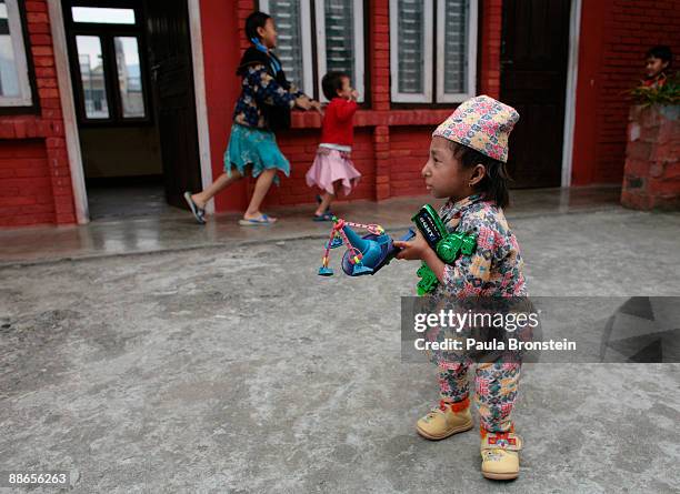 Khagendra Thapa Magar, 15 and a half, plays with his toys on March 12, 2007 in Pokhara, Nepal. According to the Guinness World Book of Records when...