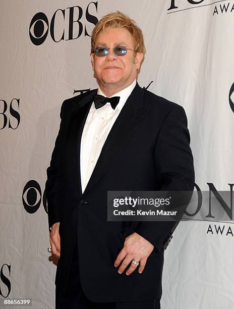 Elton John poses in the press room during the 63rd Annual Tony Awards at Radio City Music Hall on June 7, 2009 in New York City.