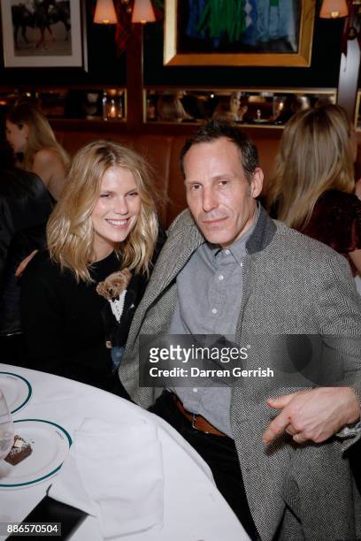 Alexandra Richards and Marlon Richards attend the Polo Bear Holiday Dinner hosted by Polo Ralph Lauren and Alexandra Richards at RalphÕs Coffee & Bar...