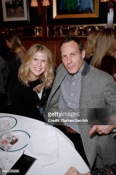 Alexandra Richards and Marlon Richards attend the Polo Bear Holiday Dinner hosted by Polo Ralph Lauren and Alexandra Richards at RalphÕs Coffee & Bar...