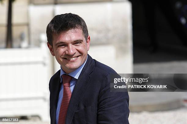 New French Housing minister Benoist Apparu smiles upon arrival on June 24, 2009 for a cabinet meeting at the Elysee palace. French President Sarkozy...