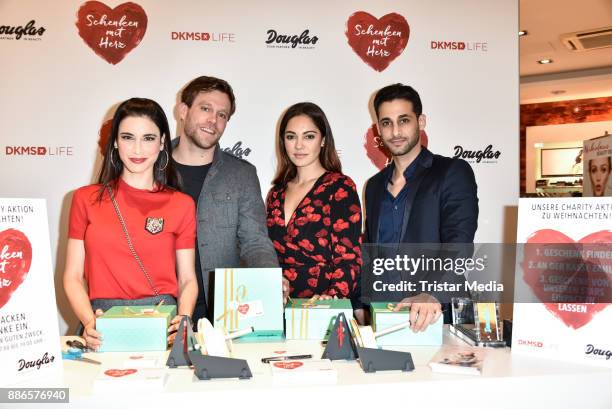 Laila Maria Witt, Ken Duken, Nilam Farooq and Karim Duezguen Guenes during the X-Mas Charity Campaign 'Schenken mit Herz' on December 5, 2017 in...