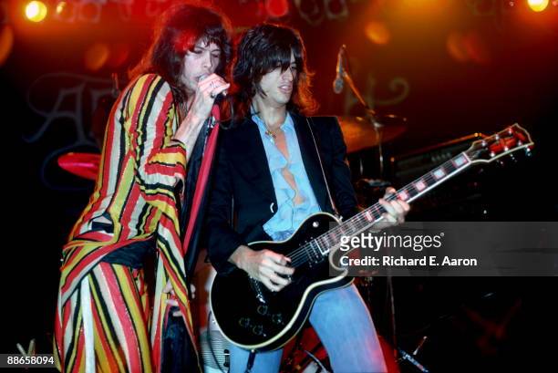 Steven Tyler and Joe Perry of American rock band Aerosmith perform on stage at Madison Square Garden on December 3rd 1975 in New York.