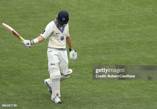 Ed Cowan of NSW walks off after he was dismissed during day four of the Sheffield Shield match between New South Wales and Tasmania at Blundstone...