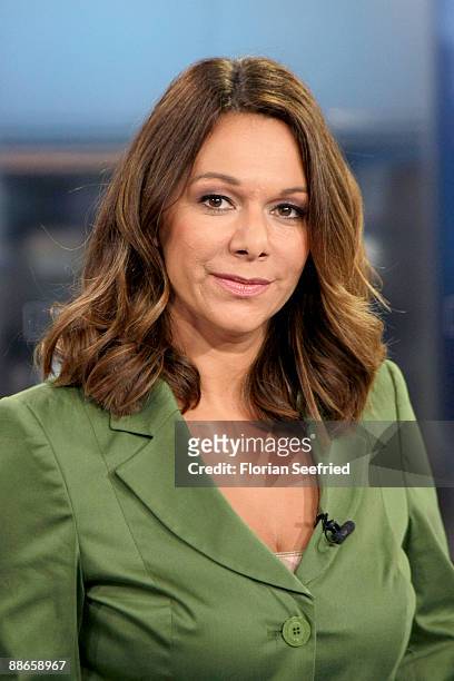 Host of N24 Dr. Christina von Ungern-Sternberg pose in the N24 studio at Potsdamer Platz on June 24, 2009 in Berlin, Germany. The N24 newsroom, which...