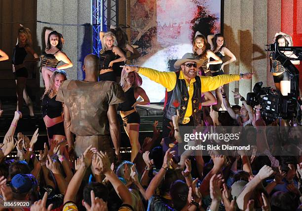 Hank Williams Jr. Performs for the taping of the opening segment of the 40th Anniversary of Monday Night Football at Centennial Park outside the...