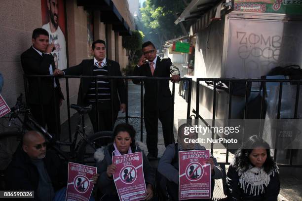 Portrait of a young activist injured during the protest against a law that militarizes crime fighting in the country outside the Senate, Mexico City,...