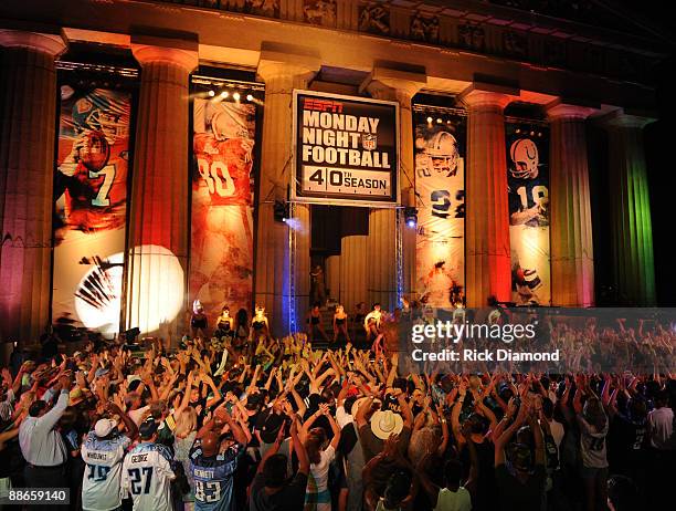 Hank Williams Jr. Performs for the taping of the opening segment of the 40th Anniversary of Monday Night Football at Centennial Park outside the...