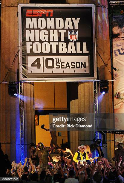 Hank Williams Jr. Performs for the taping of the opening segment of the 40th Anniversary of Monday Night Football at Centennial Park outside the...