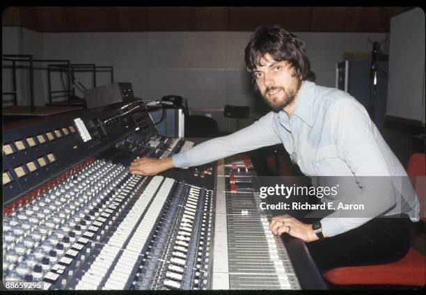 British producer and musician Alan Parsons poses at mixing desk in the control room of Media Sound Studios recording studio in 1979 in New York, USA.