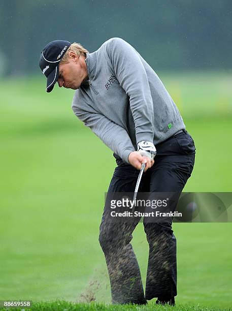 Former German and FC Bayern Munich goalkeeper Oliver Kahn plays a shot during the Pro - am prior to The BMW International Open Golf at The Munich...