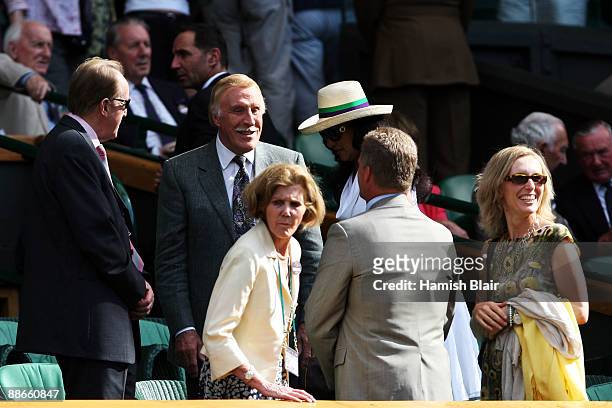 Entertainer Bruce Forsyth watches action on Centre Court on Day Three of the Wimbledon Lawn Tennis Championships at the All England Lawn Tennis and...
