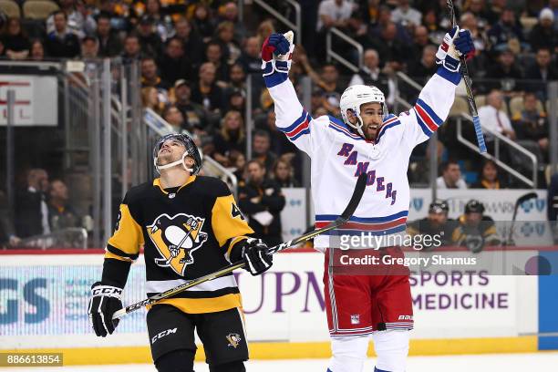 Boo Nieves of the New York Rangers celebrates his first period goal next to Conor Sheary of the Pittsburgh Penguins at PPG PAINTS Arena on December...