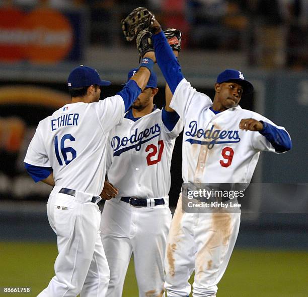 Andre Ethier , Matt Kemp and Juan Pierre of the Los Angeles Dodgers celebrate the final out of 9-1 victory over the New York Mets in Major League...