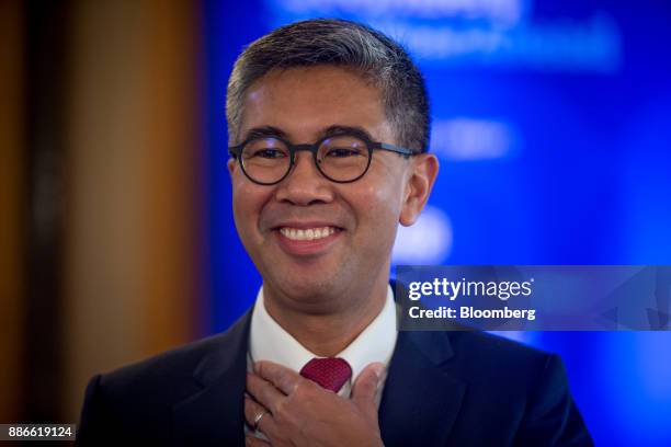 Tengku Zafrul Abdul Aziz, chief executive officer of CIMB Group Holdings Bhd., stands during a Bloomberg Television interview during the Bloomberg...