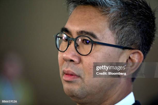 Tengku Zafrul Abdul Aziz, chief executive officer of CIMB Group Holdings Bhd., listens during a Bloomberg Television interview during the Bloomberg...