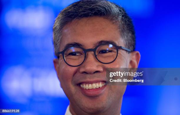 Tengku Zafrul Abdul Aziz, chief executive officer of CIMB Group Holdings Bhd., smiles during a Bloomberg Television interview during the Bloomberg...